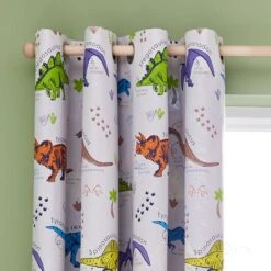 Catherine Lansfield Prehistoric Dinosaurs Blackout Eyelet Curtains